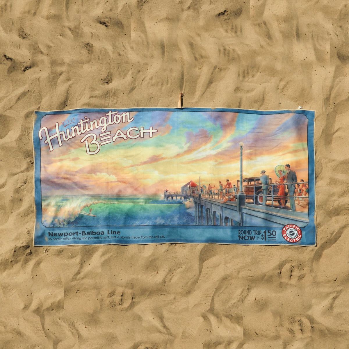 On sand: Huntington Beach pier vintage travel poster beach towel by Kerne Erickson