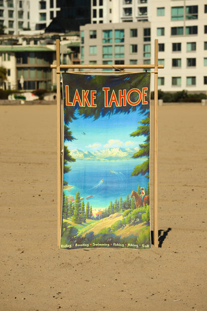 Lake Tahoe vintage travel poster beach towel hanging on a rack at the beach